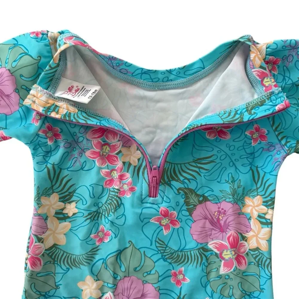 Ruffle Butts Orchid Oasis One Piece Rash Guard Swimwear Size 12-18 M UPF +50